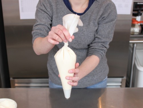 Give the piping bag a couple of twists.